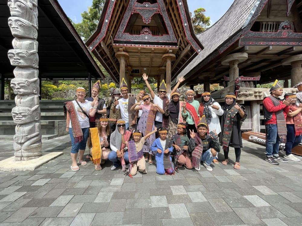 Travellers enjoying a cultural stop in North Sumatra
